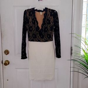Fitted Woman's Dress, Black Lace top and cream fitted bottom..1 piece.